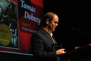 Tamas Dobozy accepts award_sml