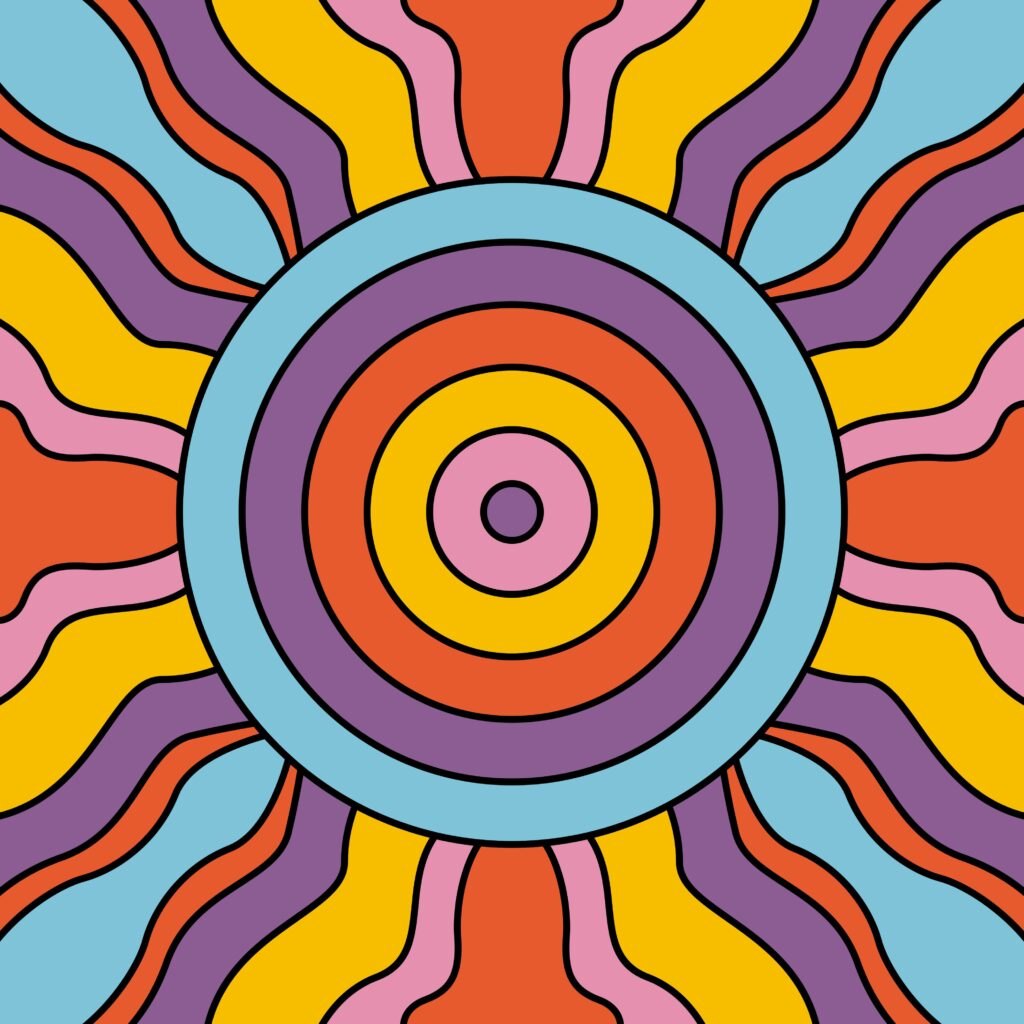 A colorful bullseye with rays of color coming out from four sides.